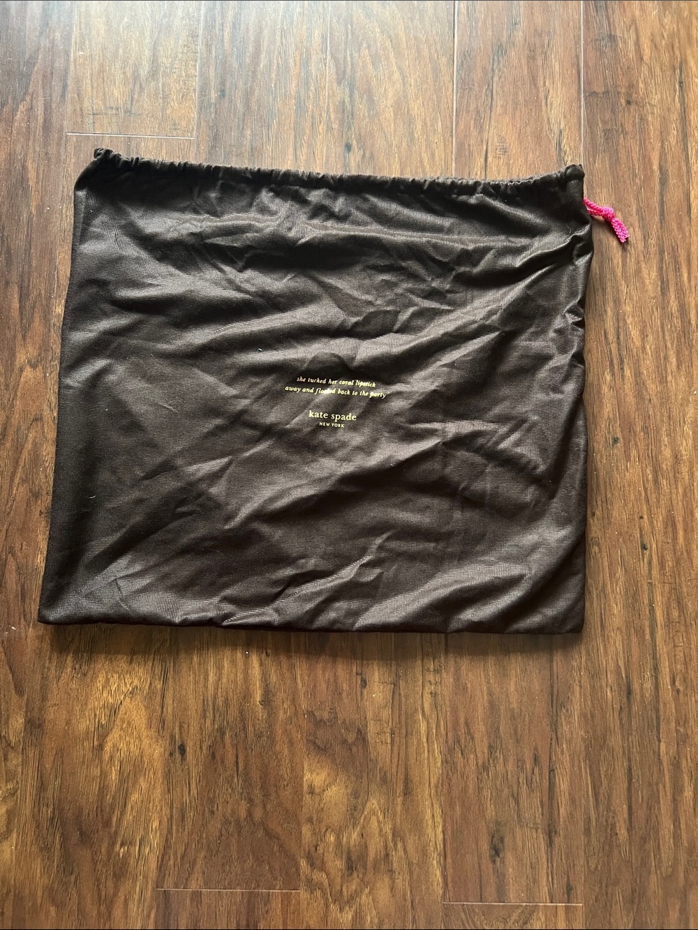 kate spade brown dust pouch with pink drawcord